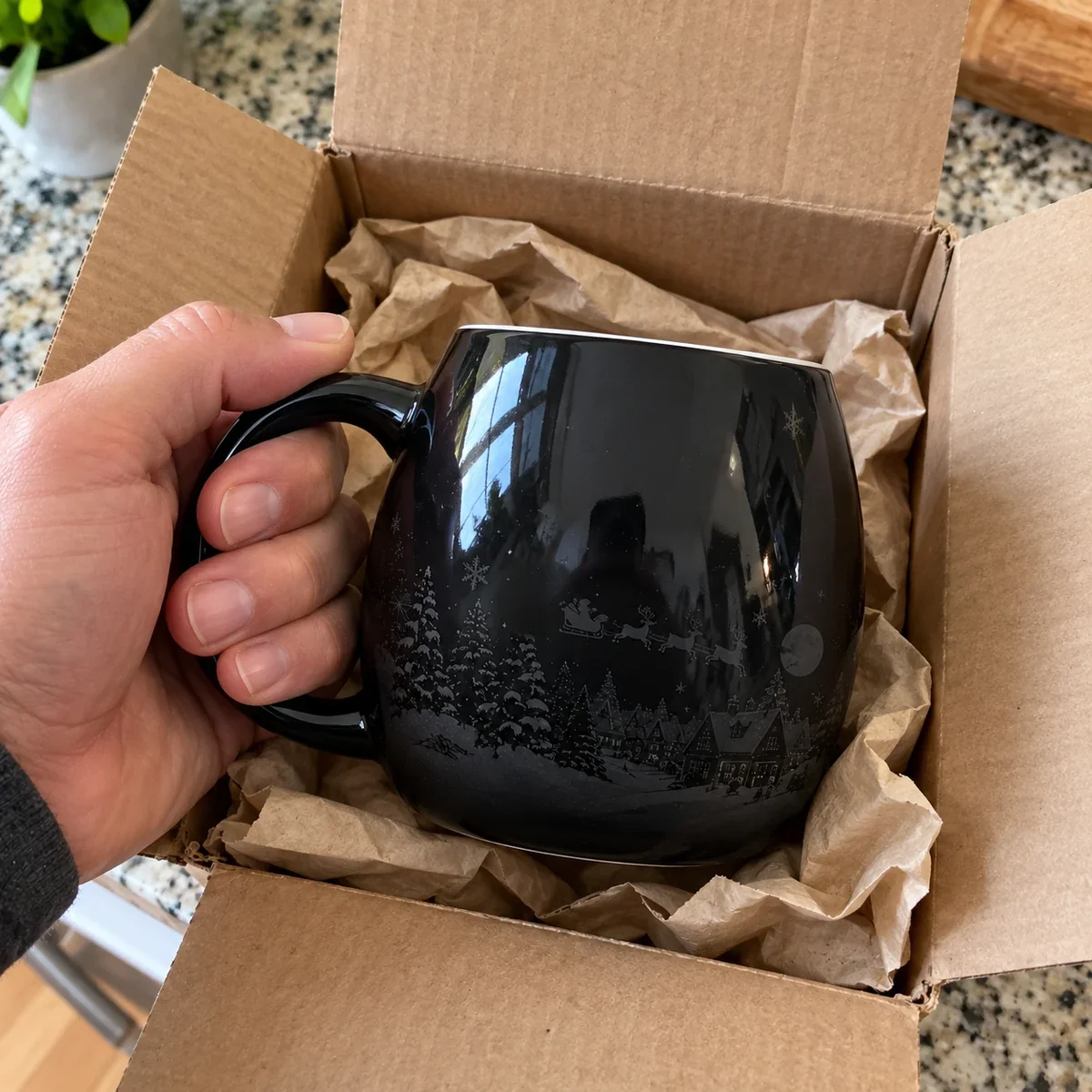 Christmas heat reveal mug in shipping box before hot water is added