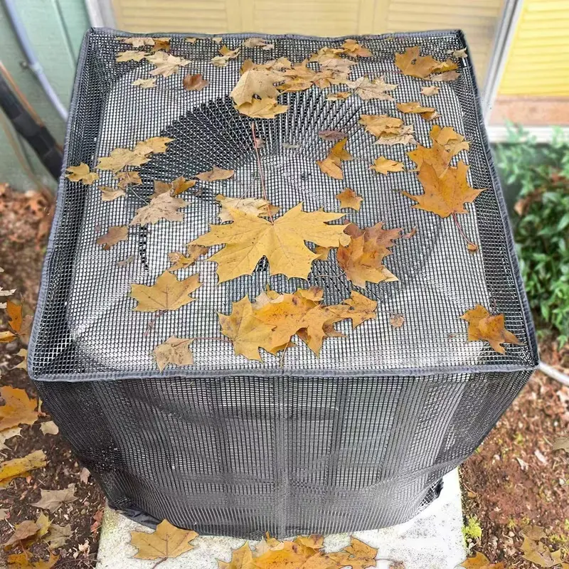 Mesh air conditioner cover catching fallen leaves