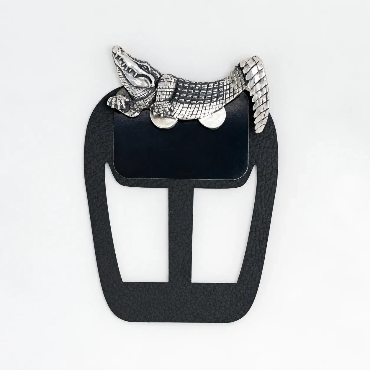 Alligator metal pocket square worn with a tailored suit