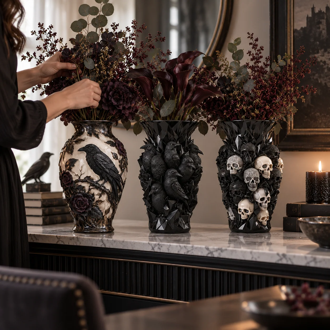 Three gothic sculptural vases styled in a dark interior