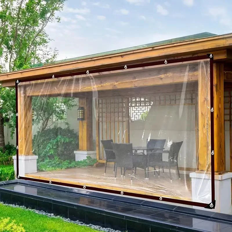 Transparent tarp reinforced corner stitching and metal grommets