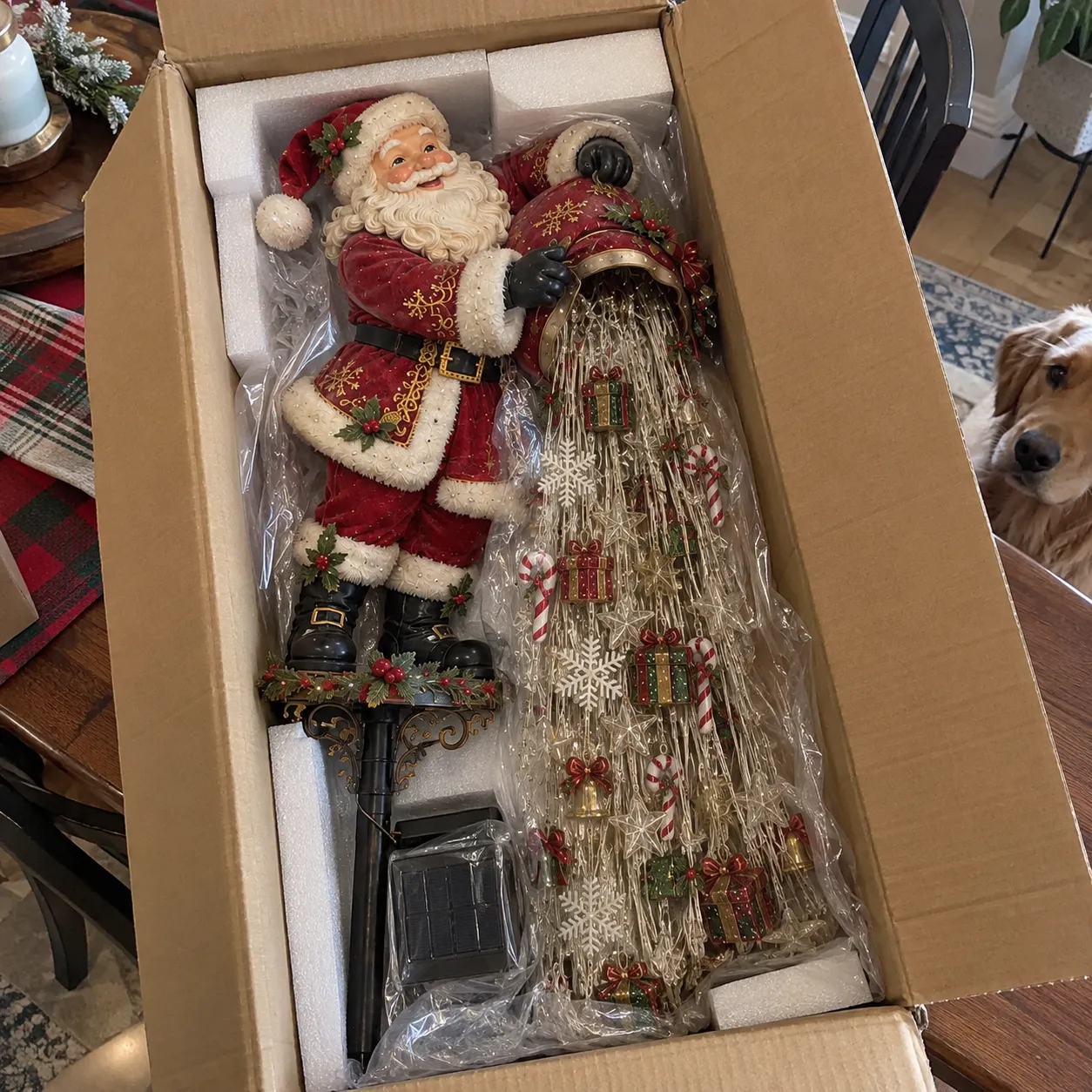 Nutcracker Christmas garden light being positioned outdoors