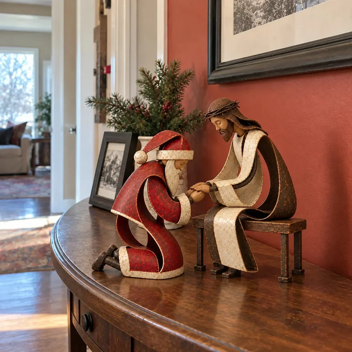 Santa and Jesus pair displayed together on a tabletop