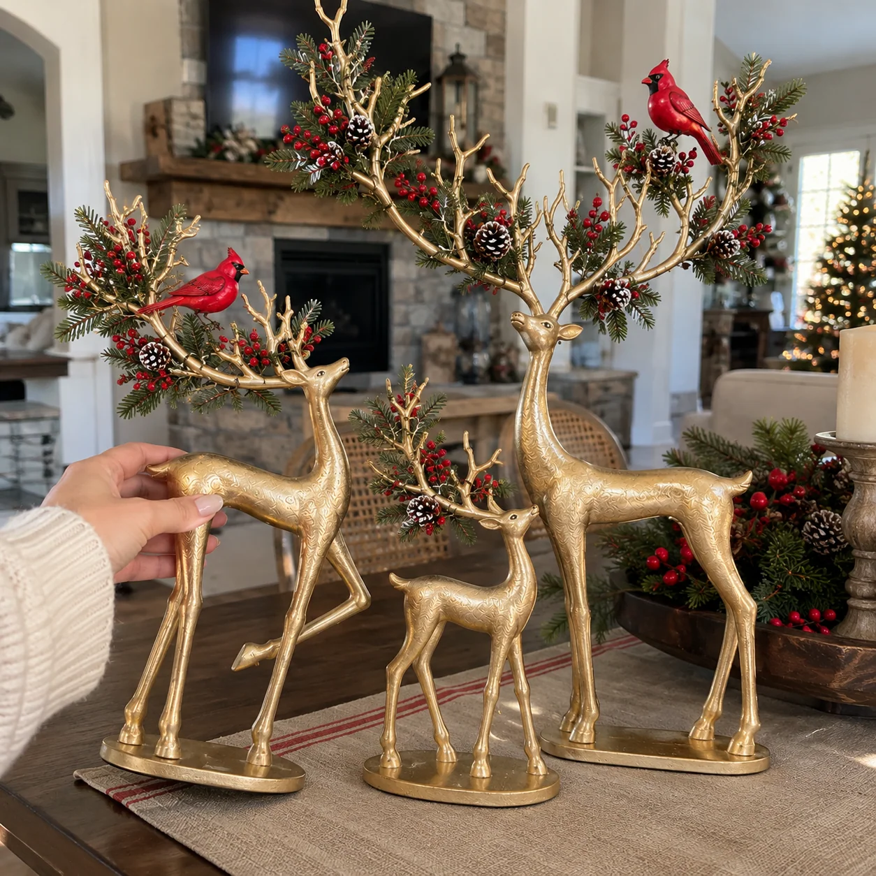 Hand placing a gold deer in a living room