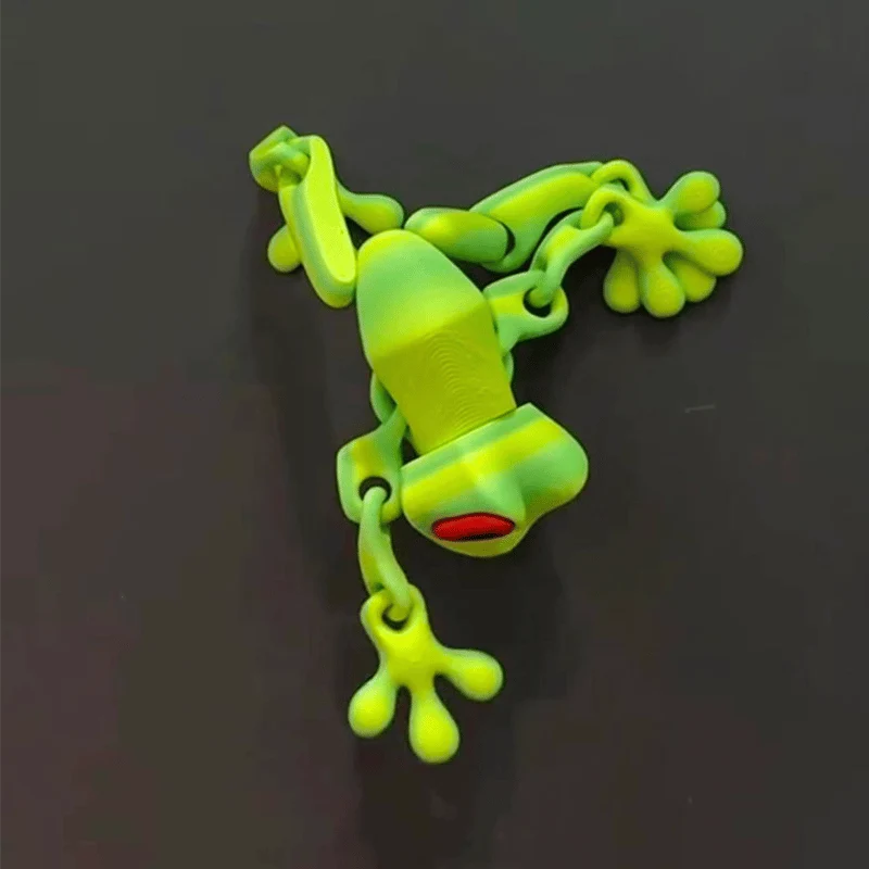 3D printed green frog showing flexible articulated legs and arms