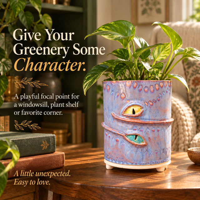 Lavender eye planter styled with greenery in a warm reading corner
