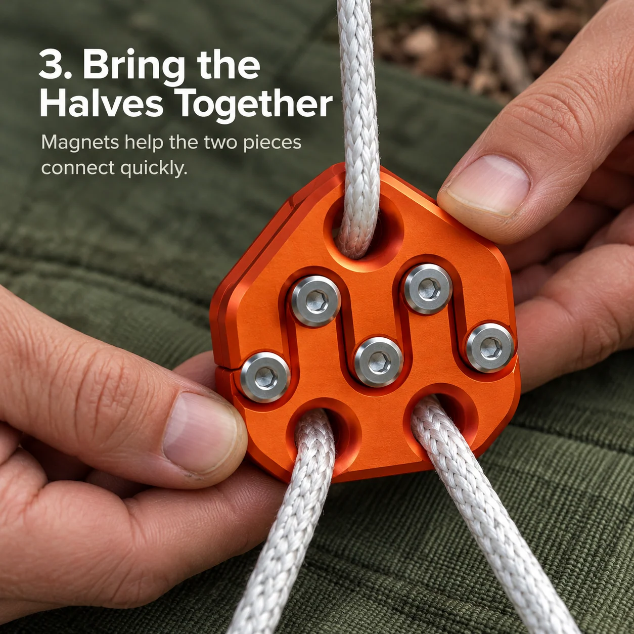 Hands aligning the two magnetic connector halves