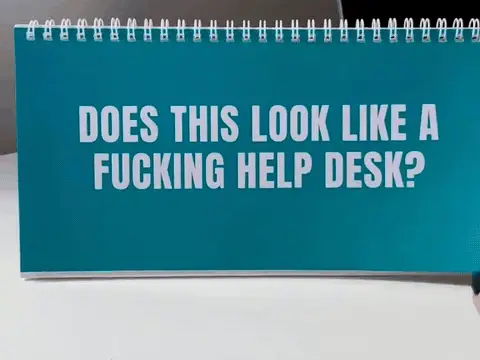 A demonstration of flipping through the turquoise desk sign's printed statuses