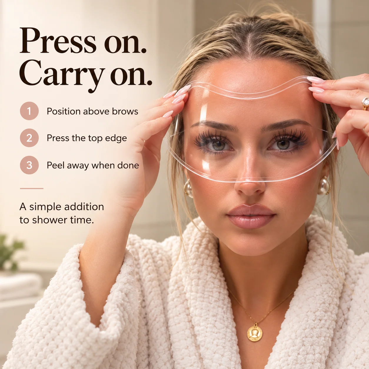 Woman positioning the transparent lash shield with both hands above her eyebrows