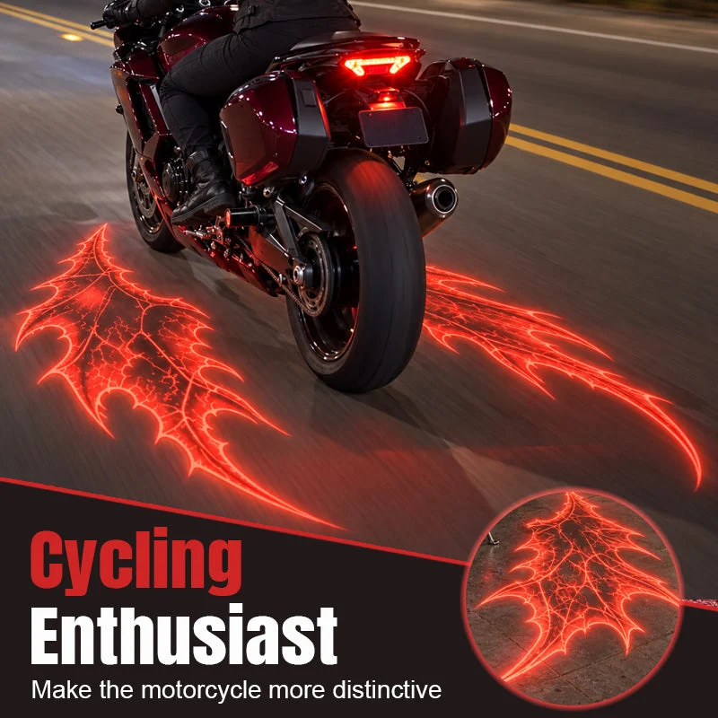 Rear view of a motorcycle with a bright red gothic wing projection extending across the road surface